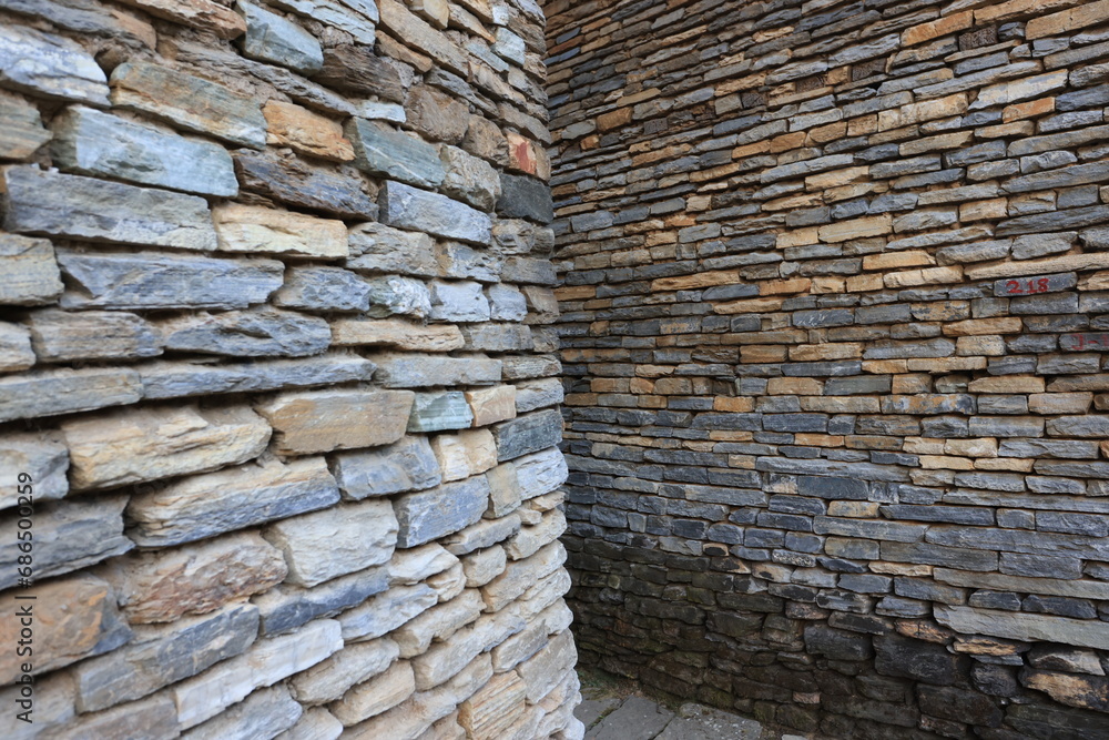 house of traditional rock wall in a Gurung village in Ghandruk town, Gandaki Province of Nepal, is a point of Annapurna circuit trek and Poonhill trekking in Nepal house of traditional rock wall in a Gurung village in Ghandruk town, Gandaki Province of Nepal, is a point of Annapurna circuit trek and Poonhill trekking in Nepal