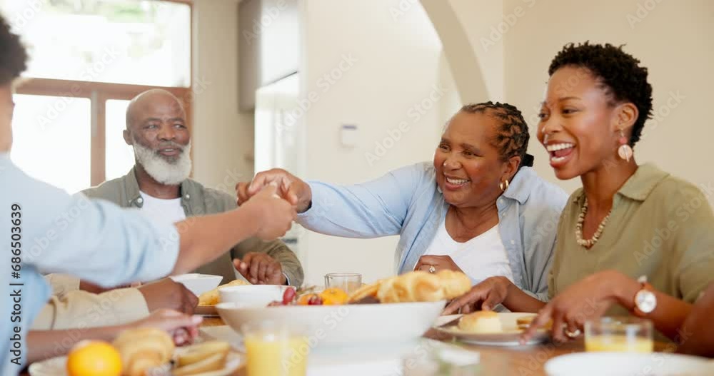 Happy, black family and children at table for lunch, supper and eating meal at home together. Grandparents, parents and kids with food for bonding, relax and talking in dining room for nutrition Happy, black family and children at table for lunch, supper and eating meal at home together. Grandparents, parents and kids with food for bonding, relax and talking in dining room for nutrition
