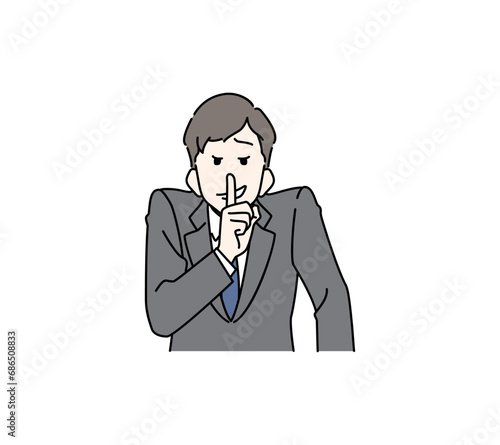 ニヤニヤしながら内緒のポーズをするスーツの男性