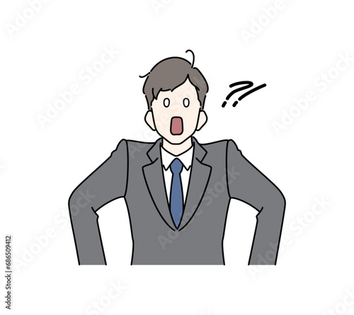 びっくりして固まるスーツの男性