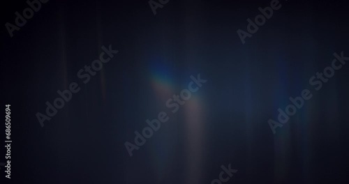 Dynamic burst of prismatic light with our Spectrum Light Flare Overlay. Against a black background, the rainbow light flares burst forth, creating an explosion of colors that energize the scene.