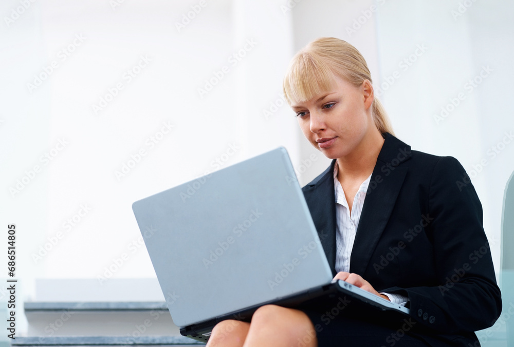 Woman on steps in office with laptop, reading email or relax in lobby for market research on website. Professional businesswoman on stairs typing online review, feedback report or business schedule. Woman on steps in office with laptop, reading email or relax in lobby for market research on website. Professional businesswoman on stairs typing online review, feedback report or business schedule.