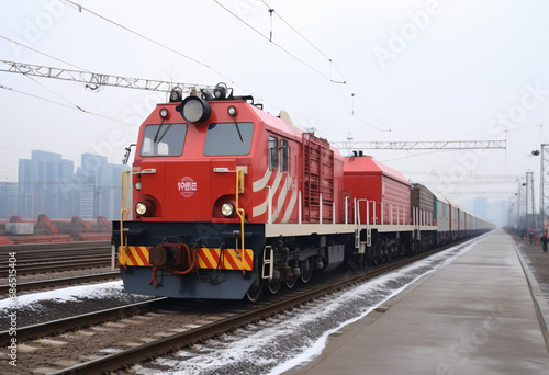 a red train pulling into a station on tracks, in the style of industrial and technology