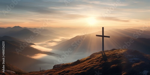Cross on a mountain in ethereal clouds