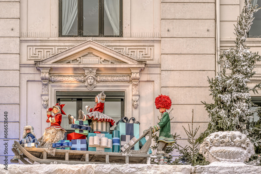 Santa Claus drives his sleigh with Christmas presents, a decoration 2023 on the hotel d'angleterre in Copenhagen