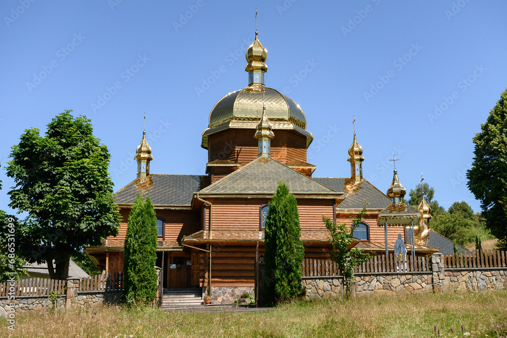 A small wooden church in a mountain village of Ukraine.