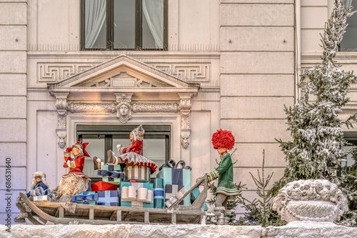 Santa Claus drives his sleigh with Christmas presents, a decoration 2023 on the hotel d'angleterre in Copenhagen