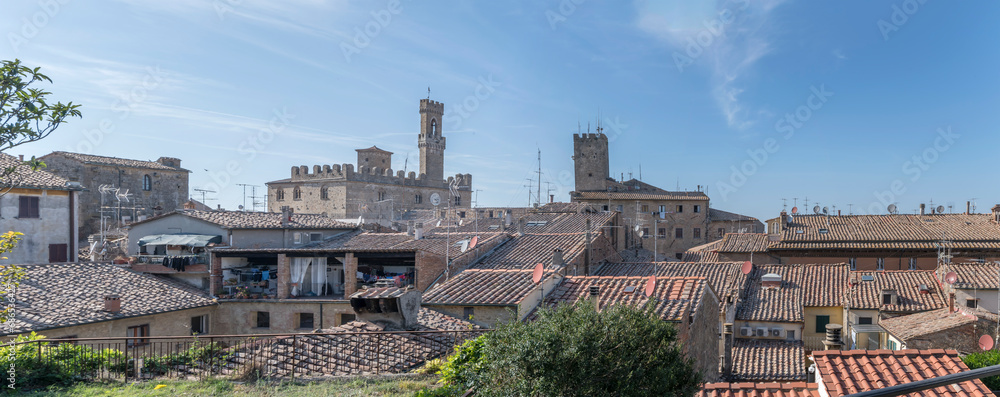 towers and tile roofs from east at Volterra, Italy