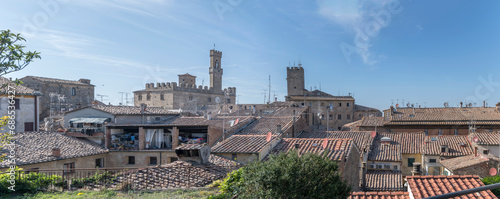 towers and tile roofs from east at Volterra, Italy