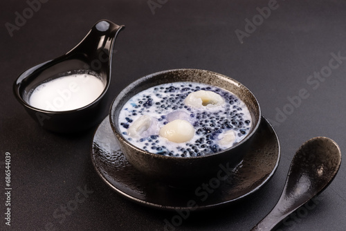 Sago Thai Dessert, Blue Tapioca Pearls with Longan in Coconut Sauce.