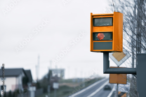 Yellow speed camera traffic control. photo