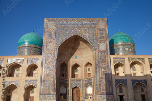 Traditional uzbek pattern on the ceramic tile on the wall of the mosque