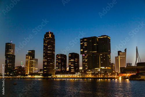 Bay of the night city of Rotterdam in the Netherlands with high-rise buildings. © Сергей Жмурчак