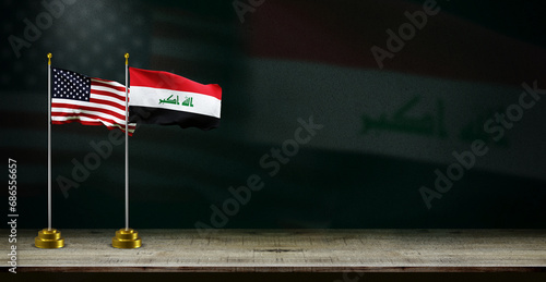 iraq and USA or america flag wave on dark background. digital illustration for national activity or social media content.