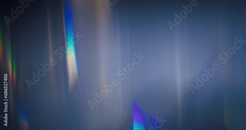 Symphony of vibrant light and color with our Spectrum Light Flare Overlay. Against a black background, radiant prism rainbow light flares create a captivating visual display that enchants the senses.