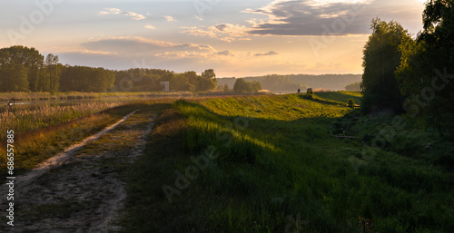 Sunset over a tributary of the Narew River, Central Poland