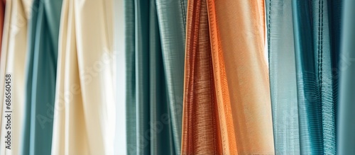 Detailed view of window curtains made of fabric © Lasvu