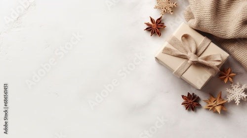 Autumn or winter composition. Gift box Coffee cup, cinnamon sticks, anise stars, beige sweater with knitted blanket on cream color gray fluffy background with generative ai © ImronDesign