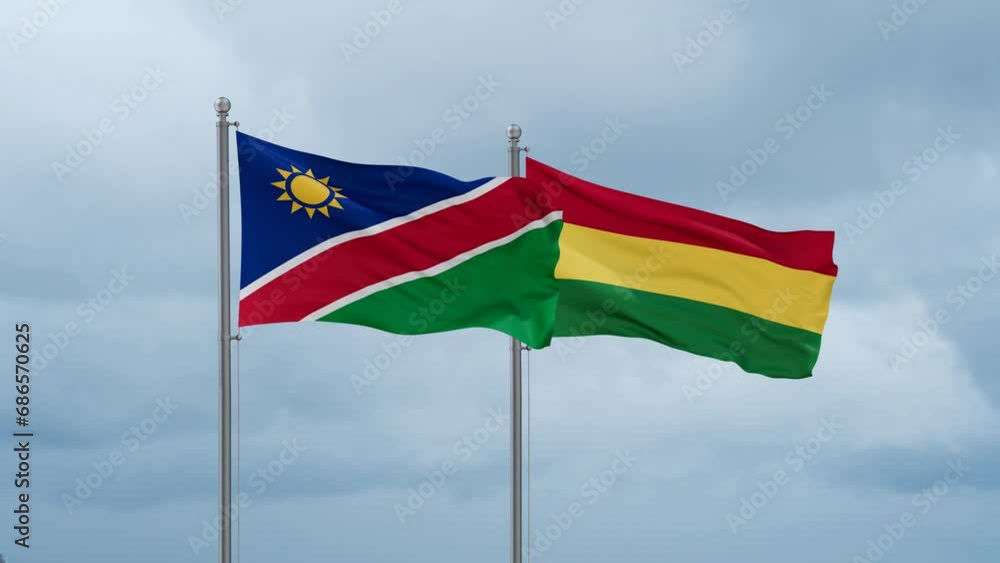 Bolivia flag and Namibia flag waving together on cloudy sky, endless seamless loop, two country relations concept Bolivia flag and Namibia flag waving together on cloudy sky, endless seamless loop, two country relations concept