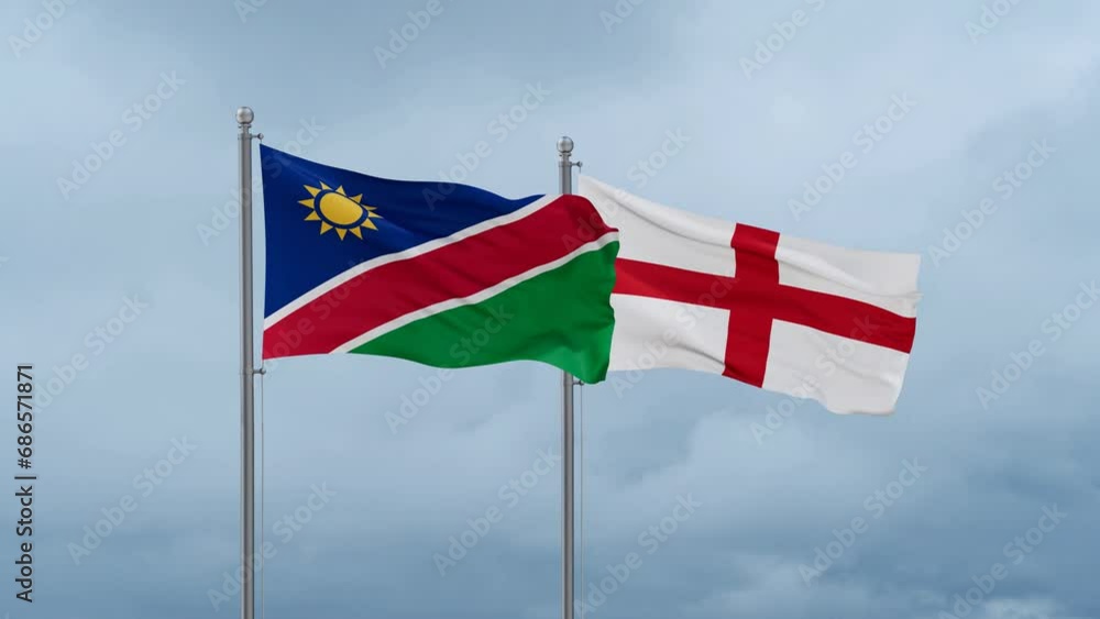 England flag and Namibia flag waving together on cloudy sky, endless seamless loop, two country relations concept England flag and Namibia flag waving together on cloudy sky, endless seamless loop, two country relations concept
