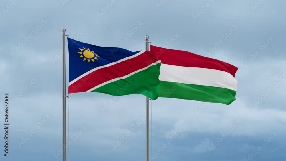 Hungary flag and Namibia flag waving together on cloudy sky, endless seamless loop, two country relations concept Hungary flag and Namibia flag waving together on cloudy sky, endless seamless loop, two country relations concept