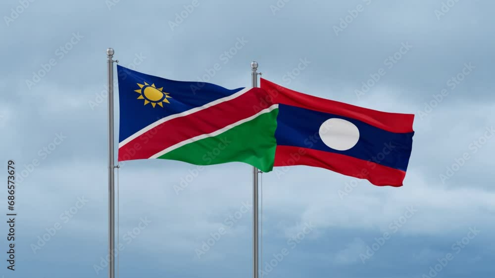 Laos flag and Namibia flag waving together on cloudy sky, endless seamless loop, two country relations concept Laos flag and Namibia flag waving together on cloudy sky, endless seamless loop, two country relations concept