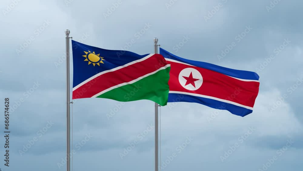 North Korea and Namibia flag waving together on cloudy sky, endless seamless loop North Korea and Namibia flag waving together on cloudy sky, endless seamless loop