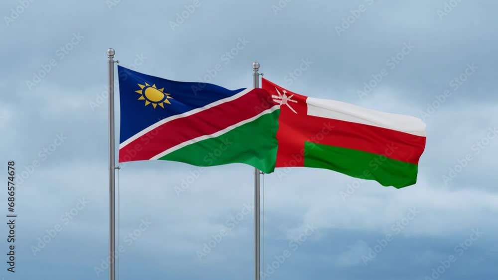 Oman and Namibia flag waving together on cloudy sky, endless seamless loop, two country cooperation concept Oman and Namibia flag waving together on cloudy sky, endless seamless loop, two country cooperation concept