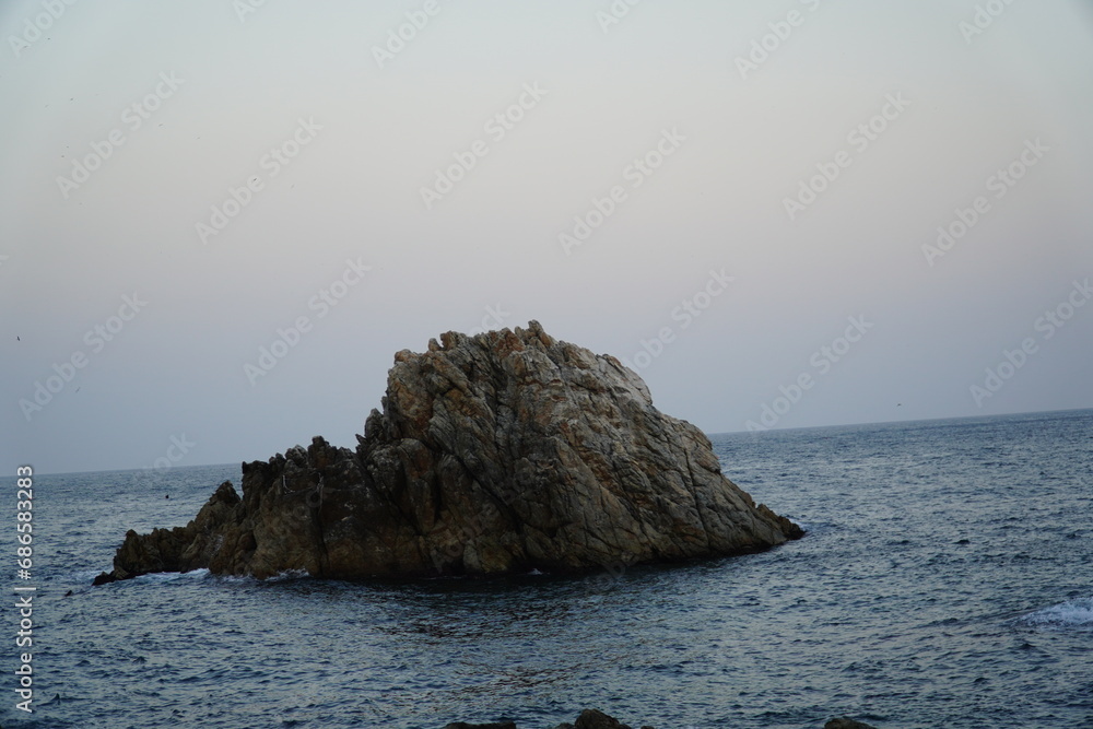 Dolsan Mountain on the sea at the port of Jangho, Samcheok, Naples in the East. Dolsan Mountain on the sea at the port of Jangho, Samcheok, Naples in the East.