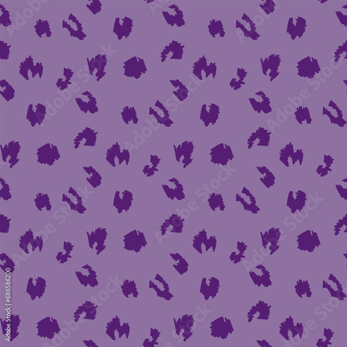 dark violet animalistic pattern on violet background. Vector image.
