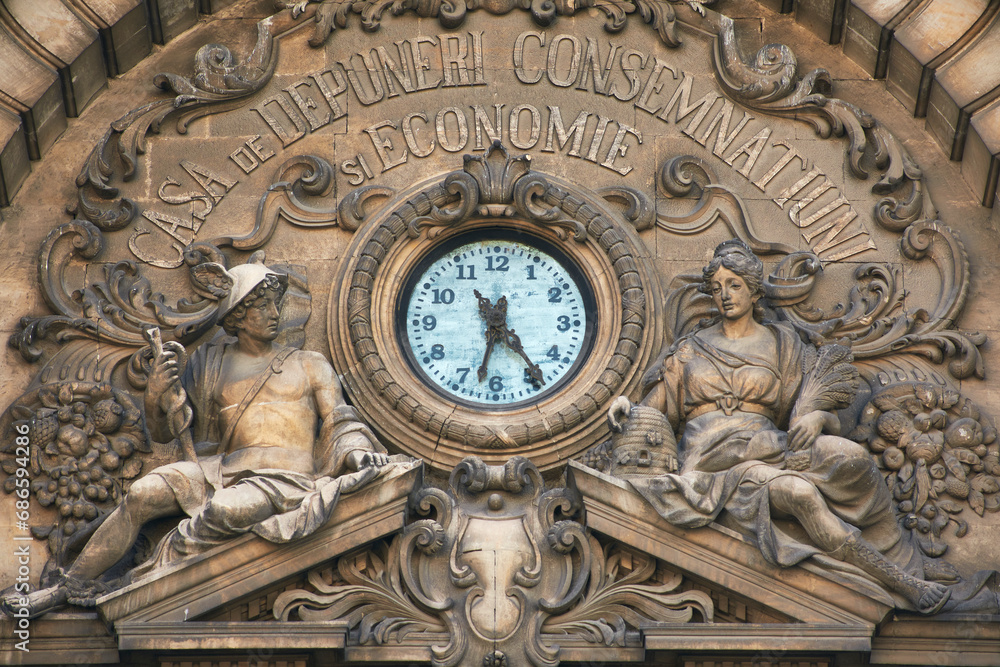 clock on the CEC Palace building in Bucharest