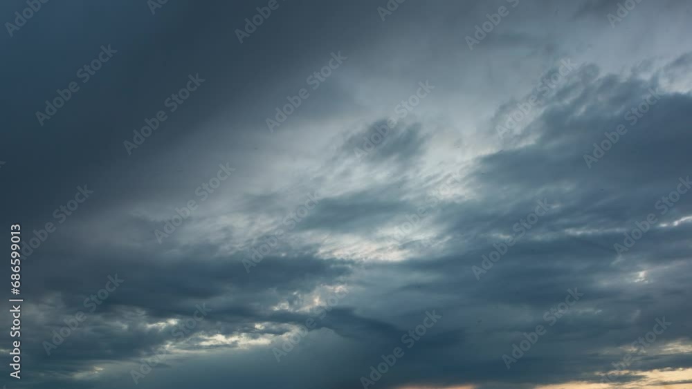 Clouds on the orange sky during sunset, many insects, time lapse Clouds on the orange sky during sunset, many insects, time lapse