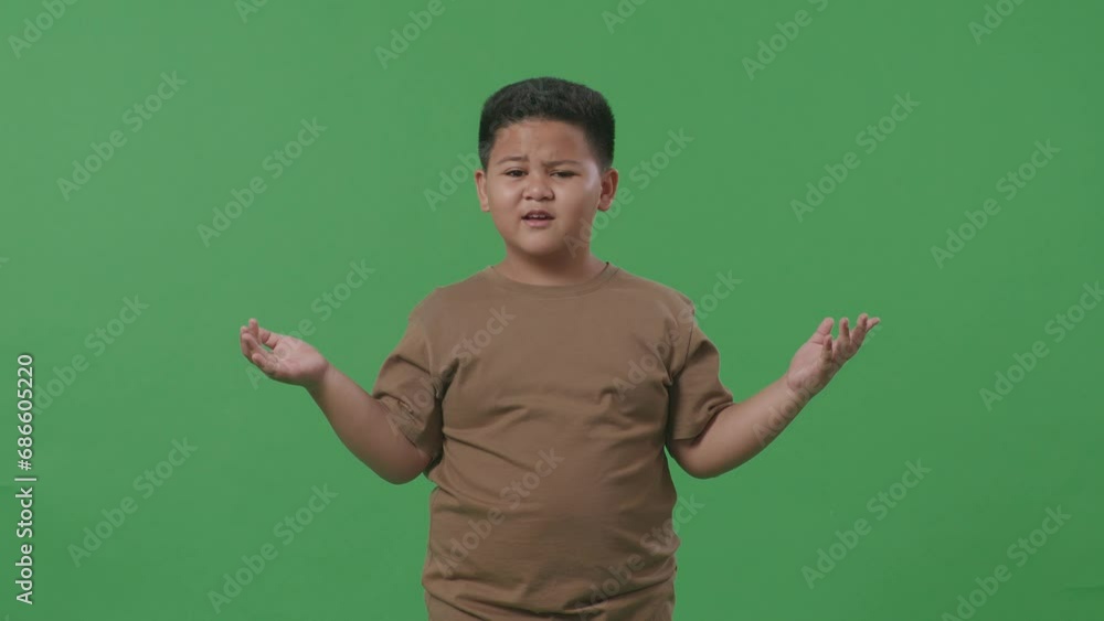 Wondering Asian Boy Saying Why Working Doubtfully In The Green Screen Background Studio
Wondering Asian Boy Saying Why Working Doubtfully In The Green Screen Background Studio