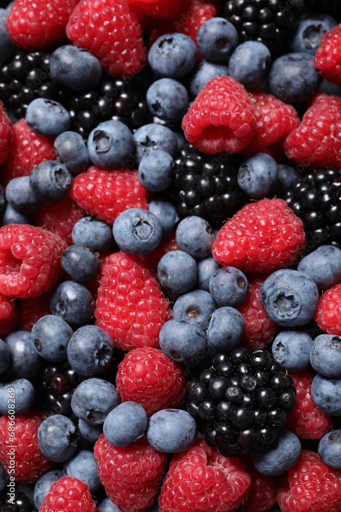 Assortment of fresh ripe berries as background, top view Assortment of fresh ripe berries as background, top view