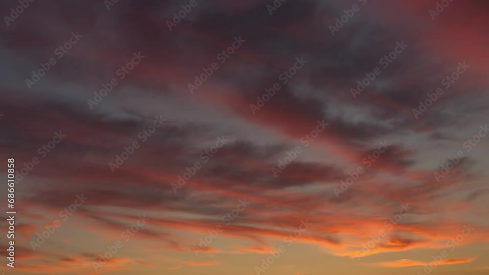 Sunset on a beautiful sky with fast moving clouds, religion, time-lapse Sunset on a beautiful sky with fast moving clouds, religion, time-lapse