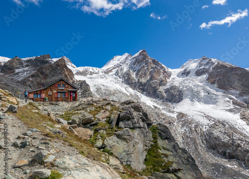 Monte Rosa (Italy) - A mountains view in Val d'Ayas with Monte Rosa mount peak of Alps, alpinistic paths to Rifugio Mezzalama e Guide di Ayas, with Blu lake; Valle d'Aosta region.