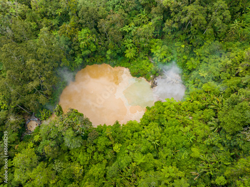 Top view of Lake Agco Mud Spa, natural lake of boiling sulfuric mud and waters heated by the underground volcanic vents. Mount Apo in Mindanao, Philippines. photo