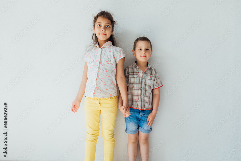 Boy brother and girl sister holding hands Boy brother and girl sister holding hands