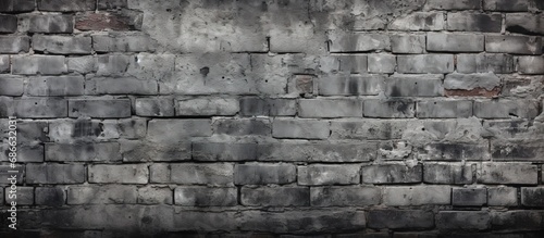 Texture of an old brick wall in gray