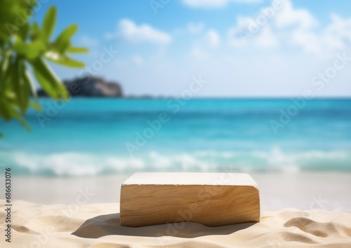 Summer sand and tropical sea background with abstract stone podium for display product mockup © Bold24