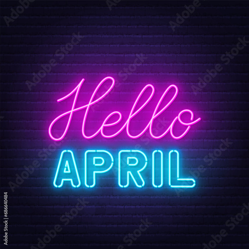 Hello April neon lettering on brick wall background.