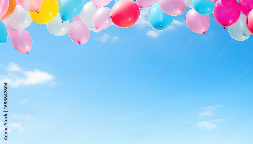 Colored balloons on blue sky background, concept carnival