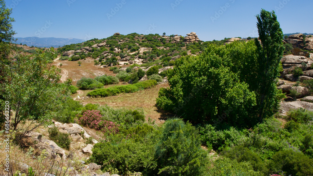 Lime rock formations on the Aegean coast in western Turkey. Volcanic lime rocks shaped by erosion. Naturally shaped sandwich rock formations. Lime rock formations on the Aegean coast in western Turkey. Volcanic lime rocks shaped by erosion. Naturally shaped sandwich rock formations.