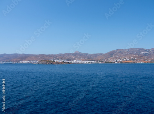 Panoramic view of the capital of Tinos island from the Aegean Sea © Alika