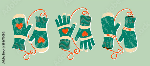 Mittens pairs flat cartoon textured illustrations set. Winter gloves and winter holiday concept. Hand drawn flat holiday symbol. Cute green mittens with hearts. Trendy illustration for print and web. photo