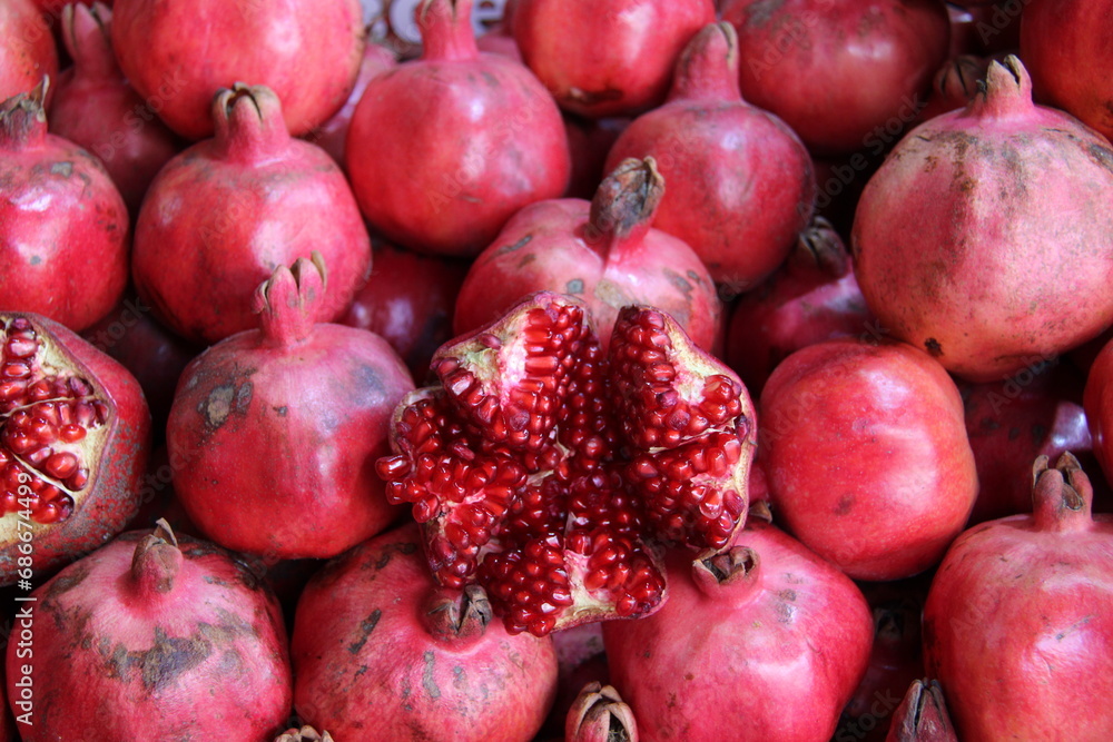 pomegranates at market.background pomegranates at market.background