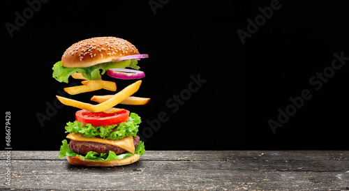  A tasty hamburger with fries, fast food