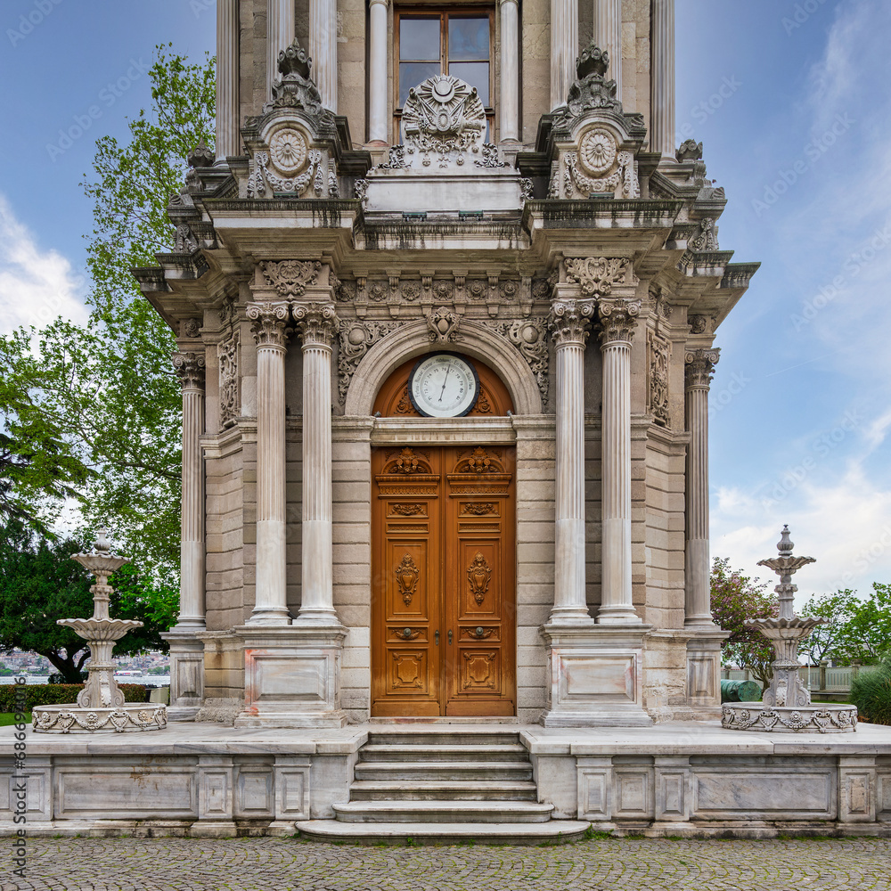 Entranceof Dolmabahce Clock Tower, or Dolmabahce Saat Kulesi, situated outside Dolmabahce Palace, Istanbul, Turkey, in a spring day