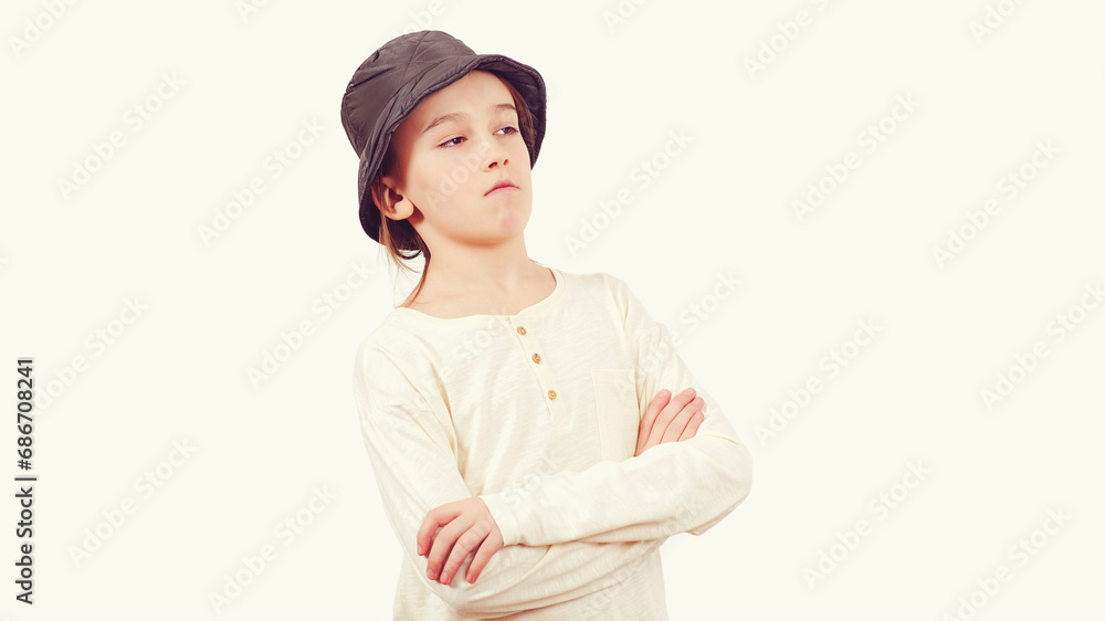 Positive teen boy crossing arms. Portrait of young thoughtful school boy. Positive teen boy crossing arms. Portrait of young thoughtful school boy.