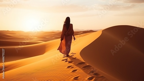 a woman is in the desert photo